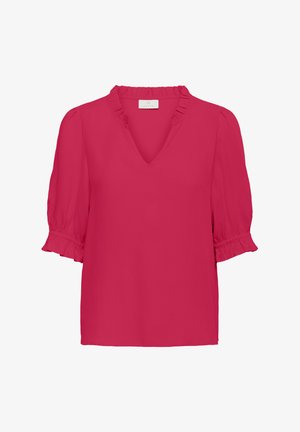 Fuksijas krāsas blūze ar V veida kakla izgriezumu, īsām pūkainām piedurknēm ar volāniem, un gludu, vieglu audumu.