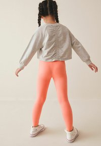 Next Legging - apricot orange