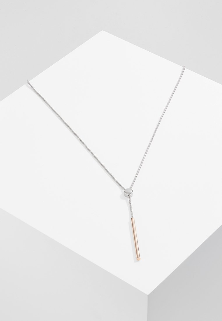 Sleek silver necklace with a cylindrical rose gold accent, featuring a thin chain and a sliding closure for adjustable length.