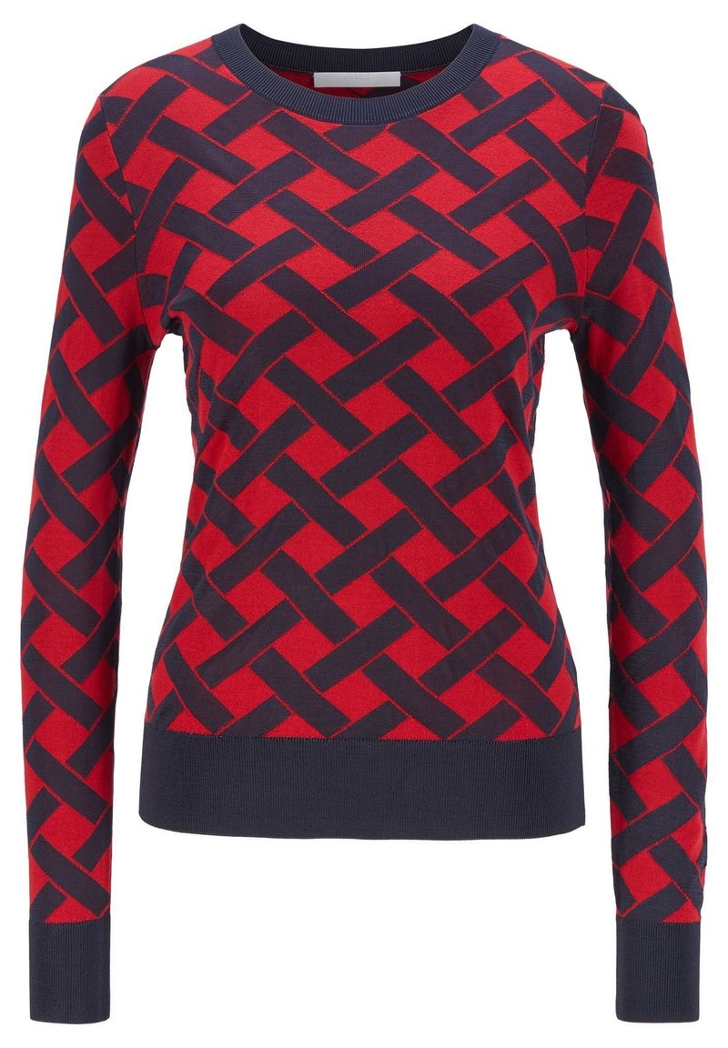 Röd och marinblå mönstrad tröja med ett vävt mönster, rund halsringning och långa ärmar med ribbade muddar och nederkant. Mjuk stickad tyg.