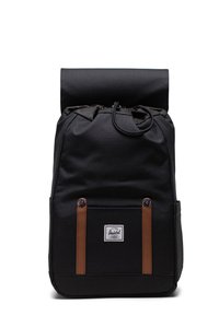 Black fabric backpack with a roll-top design, brown leather straps, notable logo patch, and drawstring closure at the top.