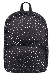 Svart ryggsäck med vita prickar, framfacky med dragkedja och svart handtagsöggla; liten Roxy-logotagg nederst till höger.