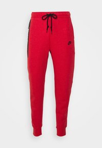 TECH FLEECE - Træningsbukser - red/black