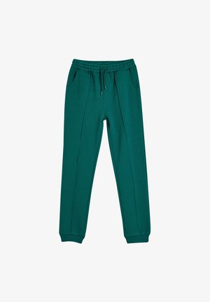 Pantalones jogger en verde azulado, hechos de una tela suave, con una cintura elástica y cordón, bolsillos laterales y puños acanalados en los tobillos.