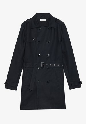 Black trench coat featuring double-breasted design, shiny black buttons, a belted waist, and two front pockets. Smooth, textured fabric.