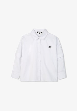 Witte lange mouwen overhemd met een button-down kraag, voorzien van een klein zwart DKNY-logo op de borst. Gemaakt van een soepele, lichte stof.