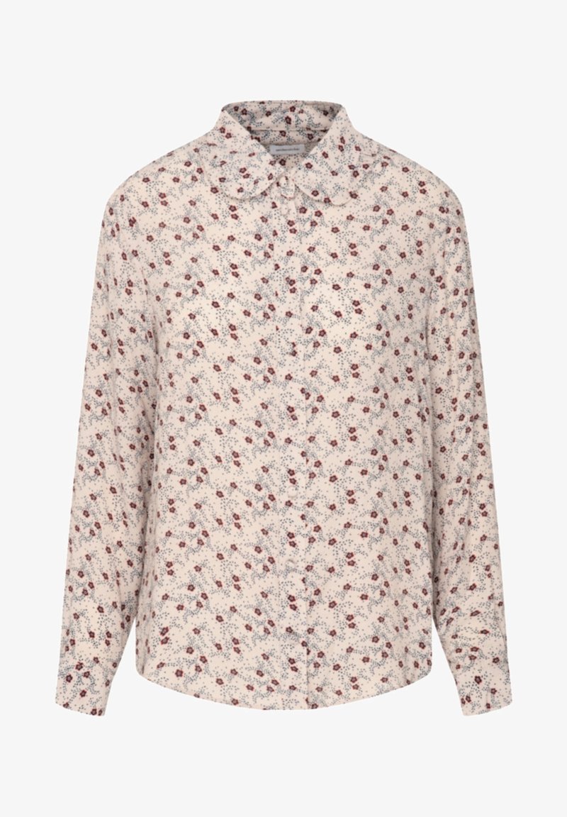 Långärmad skjorta med knappar i krämfärgad med ett blommönster i röda och blå accenter. Har en krage och en avslappnad passform.