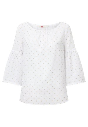 Blusa blanca con mangas acampanadas, con un escote redondo y pequeños lunares dorados. Confeccionada en una tela ligera con un acabado texturizado.