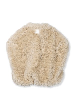 Châle en fausse fourrure beige avec une texture douce et duveteuse et une forme ronde. Dispose d'une ouverture à l'arrière pour faciliter l'enfilage.