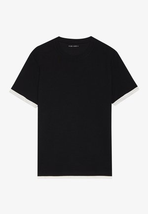 Black short-sleeve t-shirt with a textured fabric, featuring white accents on the cuffs. Rounded neckline, relaxed fit.