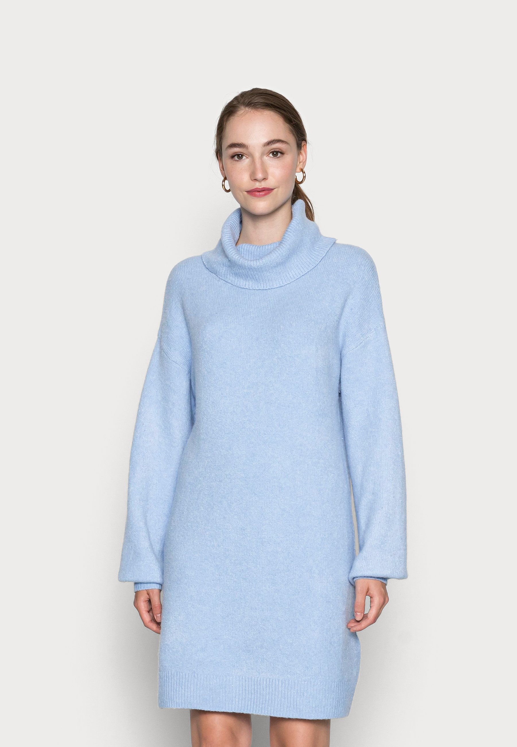 pale blue turtleneck