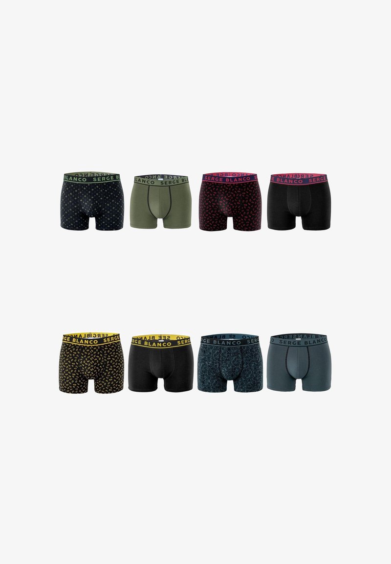 Huit paires de boxers pour hommes dans différentes couleurs et motifs, avec des ceintures élastiques portant la marque "Serge Blanco".