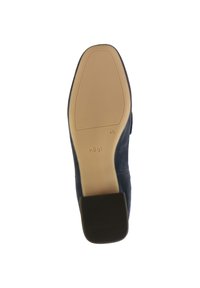 Navy suede shoe sole with a smooth tan rubber bottom, featuring a rectangular black heel and embossed brand name and size.