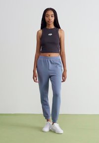 Roxy RISE VIBE PANTS - Tréningruha alsók - wild wind