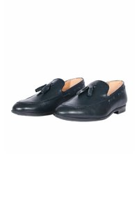 Mocassini in pelle di colore blu navy con una texture liscia, punta arrotondata e nappe decorative. Design slip-on con dettagli di cucitura minimi.