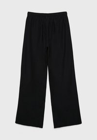 Pantalon noir à jambes larges avec taille élastique, coupe ample, sans poches visibles ni ornement, présenté à plat sur un fond clair.