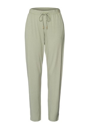 Lichtgroene joggpants van zacht materiaal. Voorzien van een elastische tailleband met een trekkoord en smalle boorden bij de enkels.