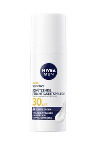 NIVEA Men Sensitive Moisturizer in a white cylindrical bottle, featuring blue accents and text indicating SPF 30 protection.