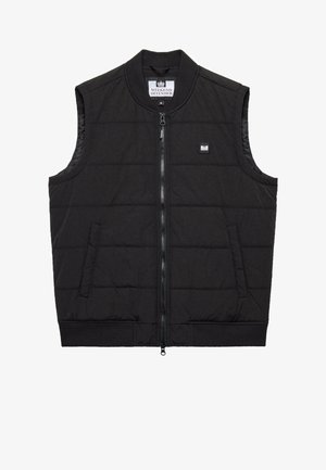 Fekete ujjatlan puffervállú mellény magas nyakkal, cipzáros záródással, oldalsó zsebekkel és kis márkázott folttal a mellkason. Tűzött textúra.