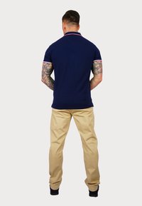 U.S. Polo Assn. Vászonnadrágok - beige