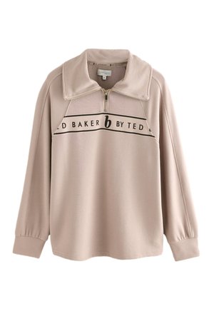 Lysebeige langærmet pullover med kvart lynlås, bred krave, ribstrikket tekstur og "b by Ted Baker" logo på brystet.