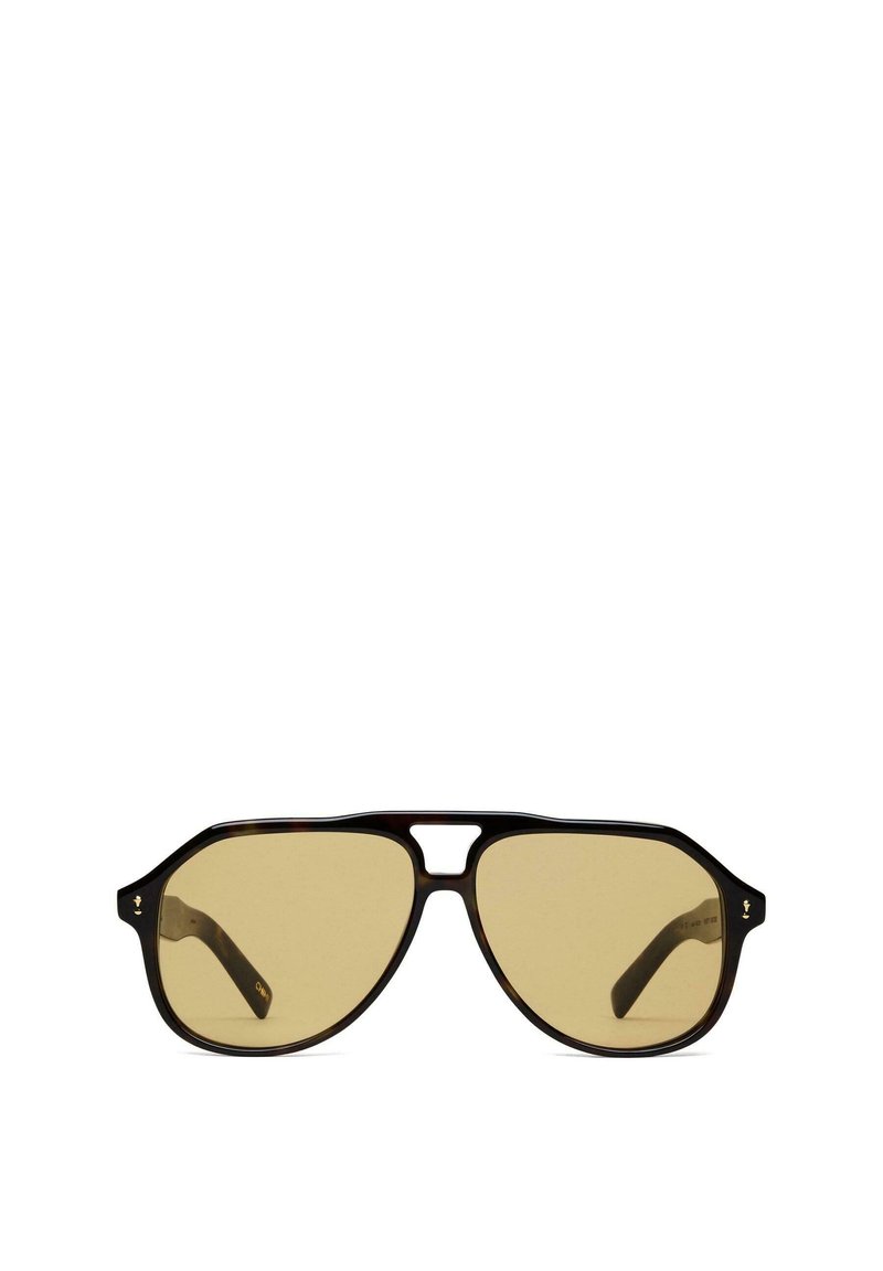 Braune Schildpatt-Sonnenbrille mit hexagonalen Gläsern. Verfügt über ein einzigartiges Brückendesign und dunkelbraune Bügel mit dezentem Branding an der Fassung.