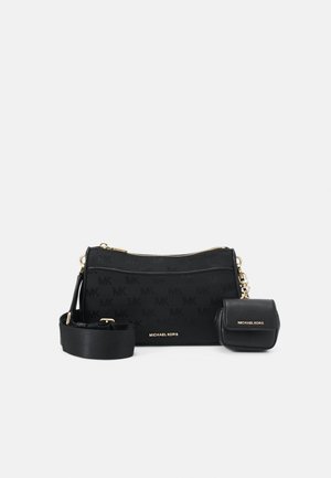 Black Michael Kors crossbody bag with adjustable strap and small matching pouch, featuring gold-tone hardware and logo details.