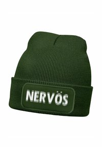 Green knit beanie with a folded cuff, featuring a rectangular patch that displays the word "NERVÖS" in white bold letters.
