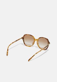 COACH Gafas de sol - caramel/snow