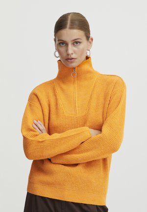 Oranger Strickpullover mit hohem Kragen und halber Reißverschluss. Verfügt über gerippte Bündchen und ein strukturiertes Design.