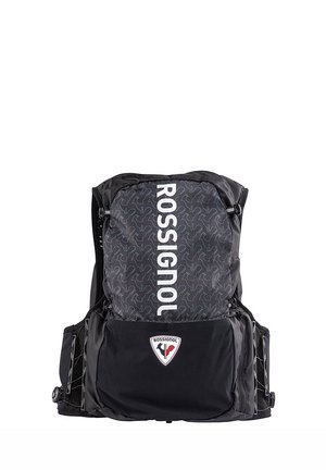 Black backpack with a patterned top, featuring the "ROSSIGNOL" logo in white. Includes side pockets and a triangular logo patch on the front.