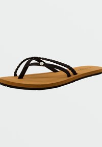 Cinghie intrecciate nere con accentuazioni argentate, suola color tan, materiale in gomma, design flat. Stile infradito casual adatto per il clima caldo.