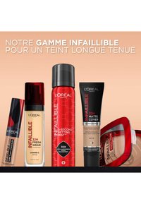 Collection de maquillage L'Oréal Infallible comprenant quatre produits : deux fonds de teint, un spray fixant et un correcteur, présentés sous différentes formes de tubes et de bouteilles.