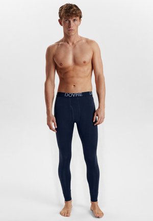 Marine termisk leggings med en strækpasform, der har et brandet livbånd. Glat tekstur, fuldlængde design og en klassisk snit for komfort.