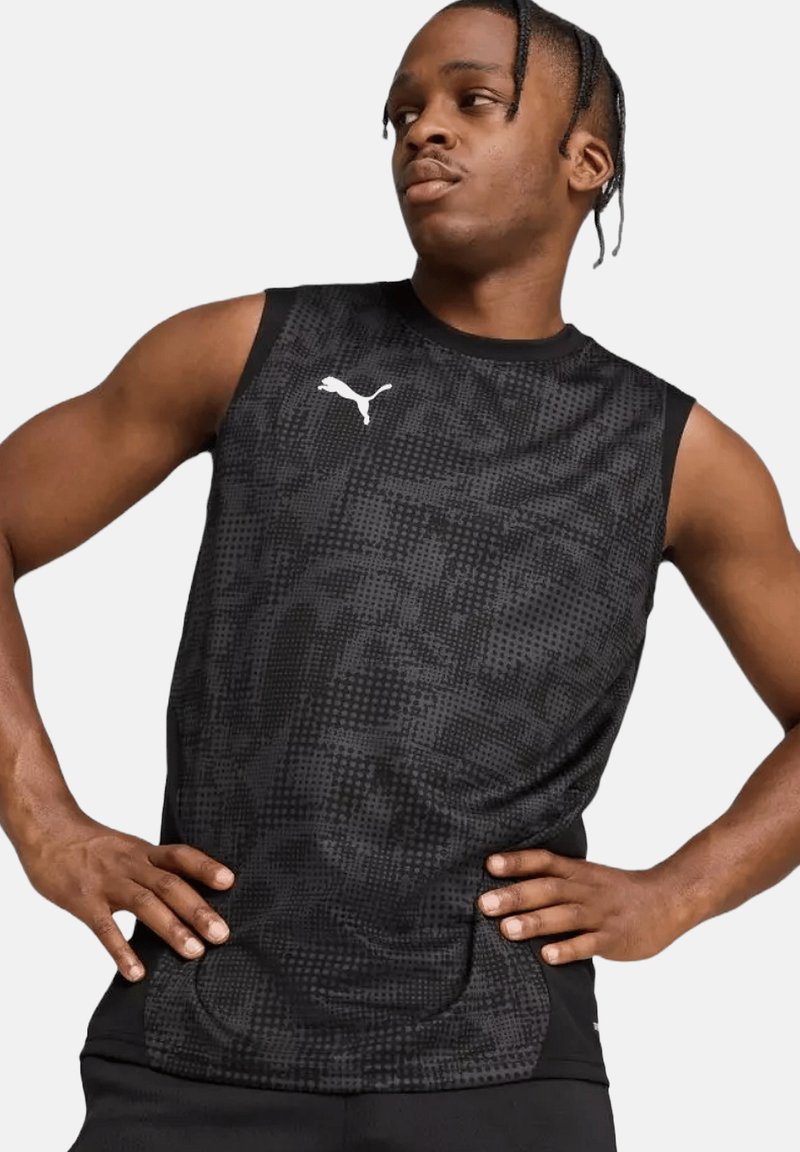 Maglietta atletica nera senza maniche con motivo testurizzato e logo Puma bianco sul petto sinistro; progettata per comfort e traspirabilità.