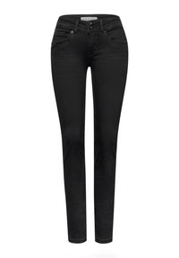 Mustat denimsiniset kapeat farkut viiden taskun mallilla, vetoketjulla ja napin suljennalla. Korostaa sileää pintaa ja hienovaraisia ompelusyksityiskohtia.