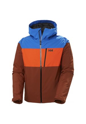Kleurgeblokte jas met een blauwe bovenkant, oranje midden en bruine onderkant. Gemaakt van glad materiaal met een rits aan de voorkant en een capuchon.