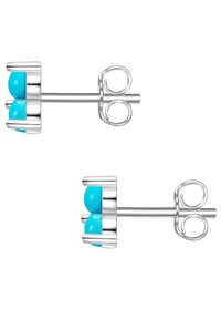 Pendientes de plata con dos piedras redondas de turquesa montadas en una base metálica pulida, con respaldos en espiral para un ajuste seguro.