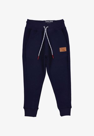Marineblaue Sweatpants mit elastischem Bund, grauem Kordelzug, seitlichen Taschen und einem braunen Lederlogo-Patch am linken Oberschenkel.