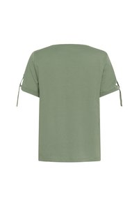 Short-sleeve olive green top made of soft fabric. Features a relaxed fit and ties on sleeves for adjustable length.
