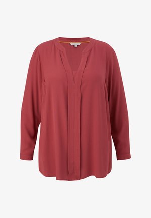 Rdeča bluzica z dolgimi rokavi in V-izrezom. Gladek material brez gumbov na sprednjem delu. Ohlapen kroj in ukrivljen rob.