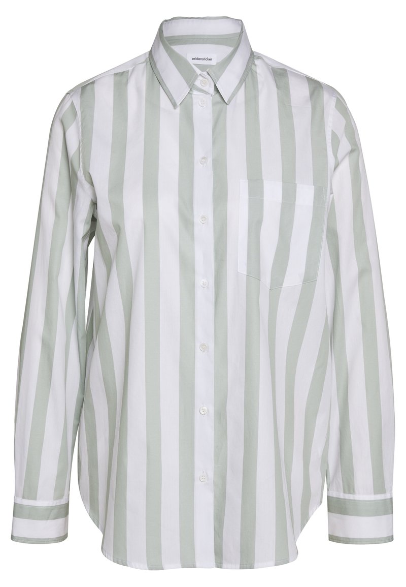 Skjorta med knäppning som har vertikala ränder i ljusgrön och vit, med en bröstficka, långa ärmar och klassisk krage. Tillverkad av bomull.