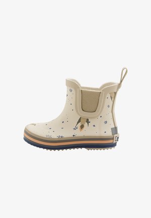 Botte de pluie en caoutchouc couleur crème avec motifs de fusée et d'étoiles. Comprend un panneau latéral élastique, une languette de traction et une semelle texturée pour l'adhérence.