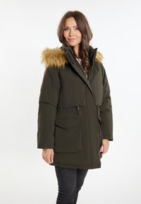 Olijfgroene parka met een faux fur-voering in de capuchon, ritszakken, een trekkoord in de taille en een relaxte pasvorm. Heeft een gladde textuur, geschikt voor koud weer.