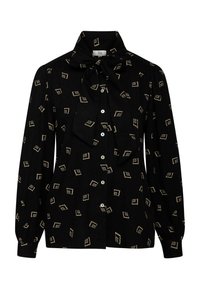 Blusa nera con maniche lunghe, dotata di colletto con fiocco, bottoni sul davanti e un motivo geometrico in oro e bianco.