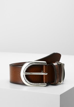 Brown leather belt with silver curved buckle, placed rolled on a white surface against a light gray background.