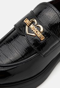 Love Moschino NEW CITY LOVE - Jalga libistatavad jalanõud - nero