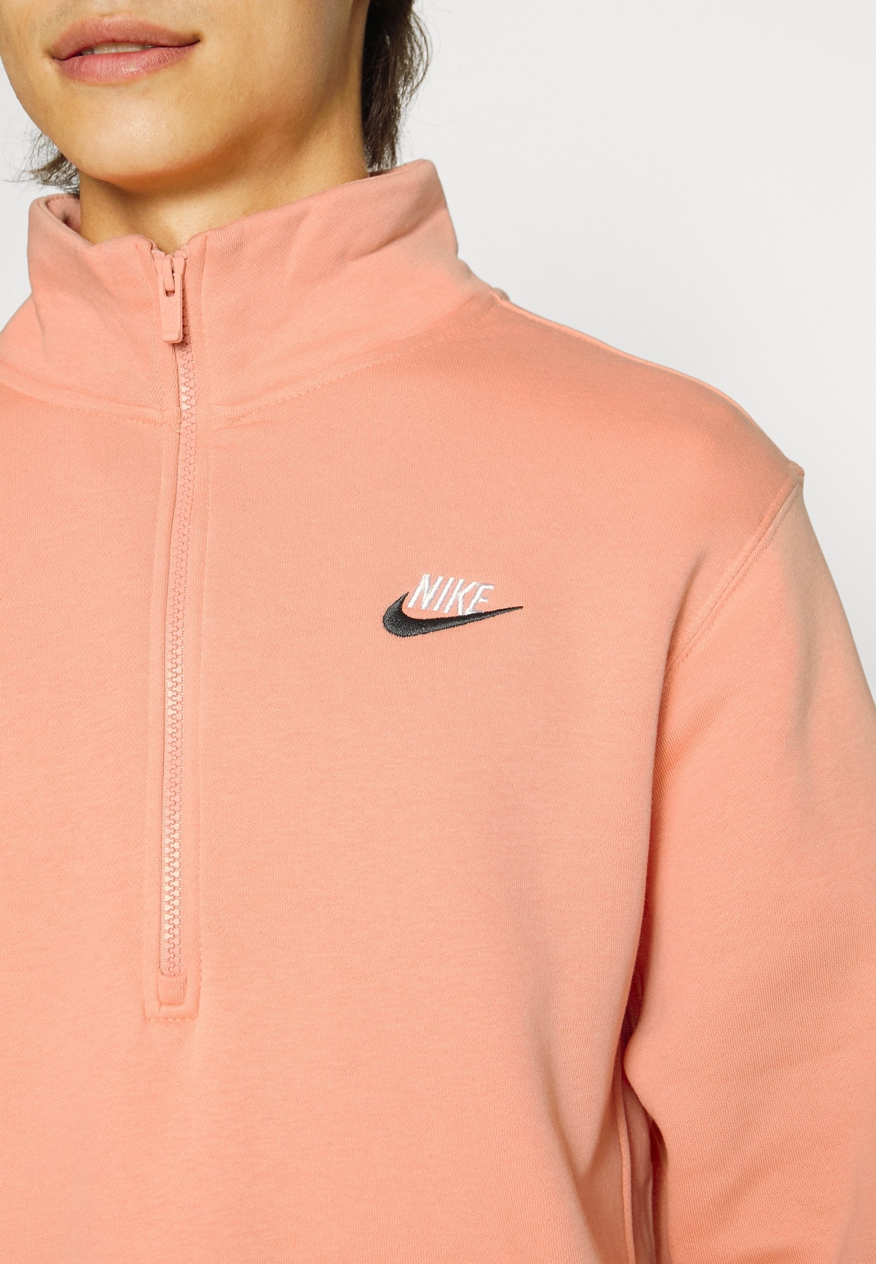 salmon nike sweatshirt