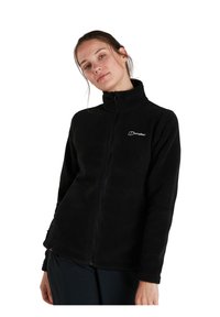 Veste en polaire noire avec un col haut et une fermeture éclair sur toute la longueur. Dotée d'un logo sur la poitrine gauche et de poches latérales. Tissu doux et texturé.