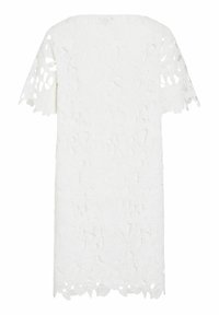 Robe courte à manches courtes en dentelle blanche avec motif floral découpé et ourlet festonné, présentée à plat avec le dos vers l'avant.